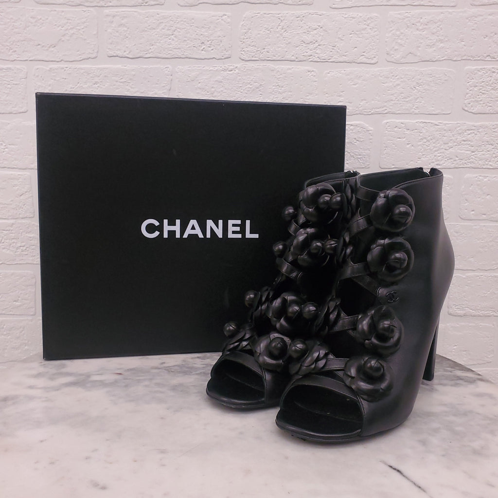 CHANEL BLACK LEATHER CAMELIA BOOTIES - SIZE 39