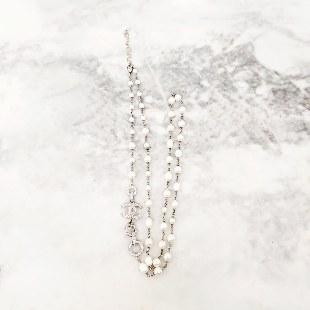 CHANEL PEARL AND SILVER CRYSTAL CHAIN LOGO NECKLACE